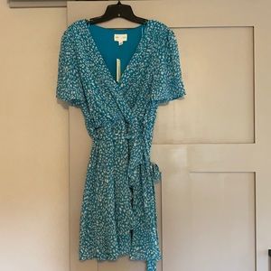Cute whimsy wrap/tie dress In turquoise color